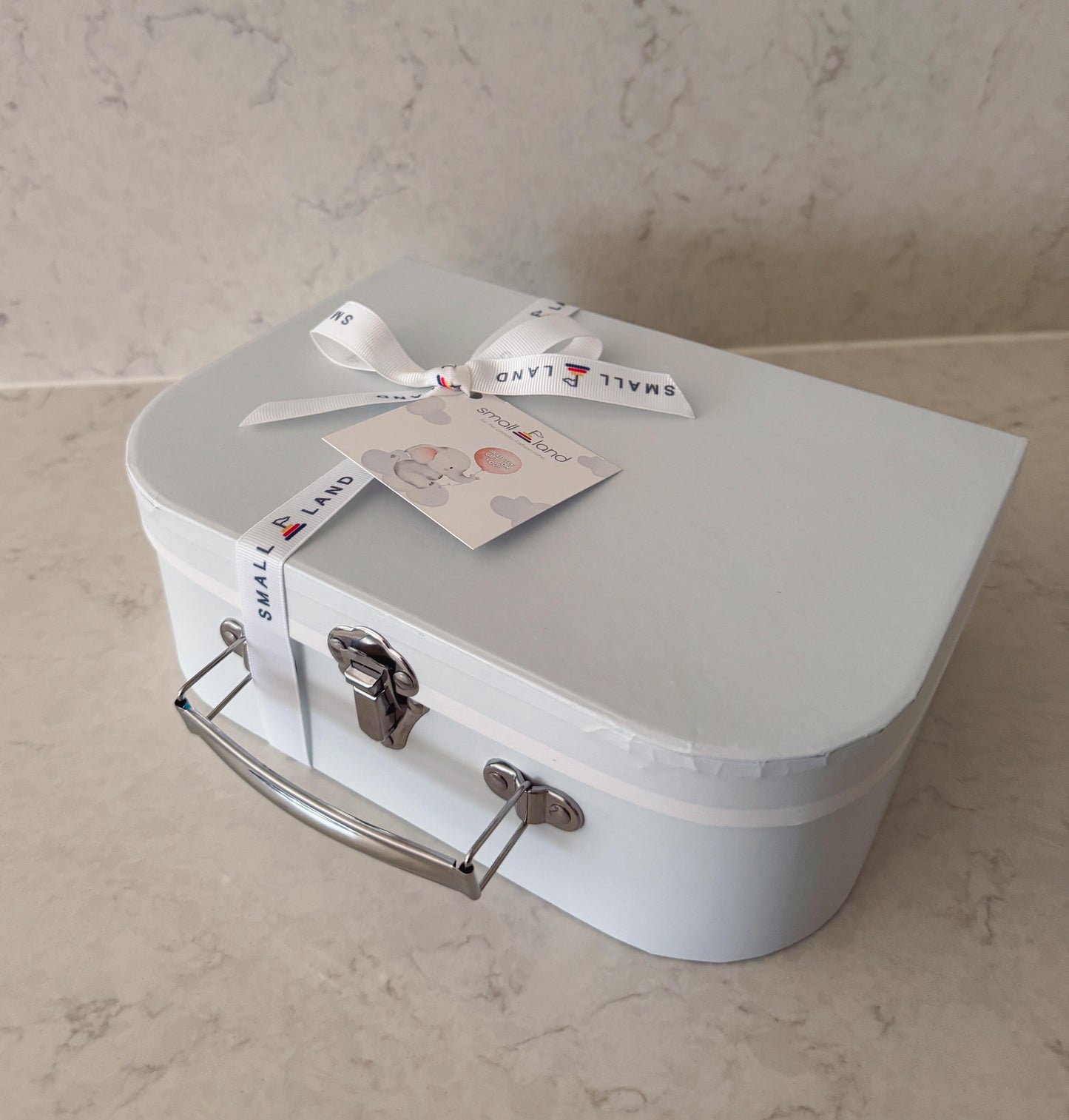 Suitcase gift box with small land ribbon and gift card