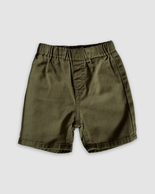 Khaki Green shorts on a light gray background