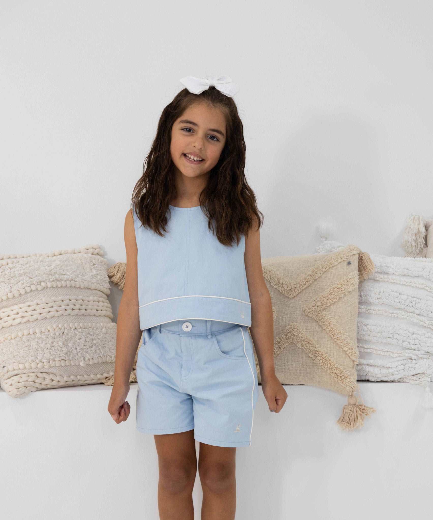6 year old toddler girl model wearing size 6/7Y Alice Set