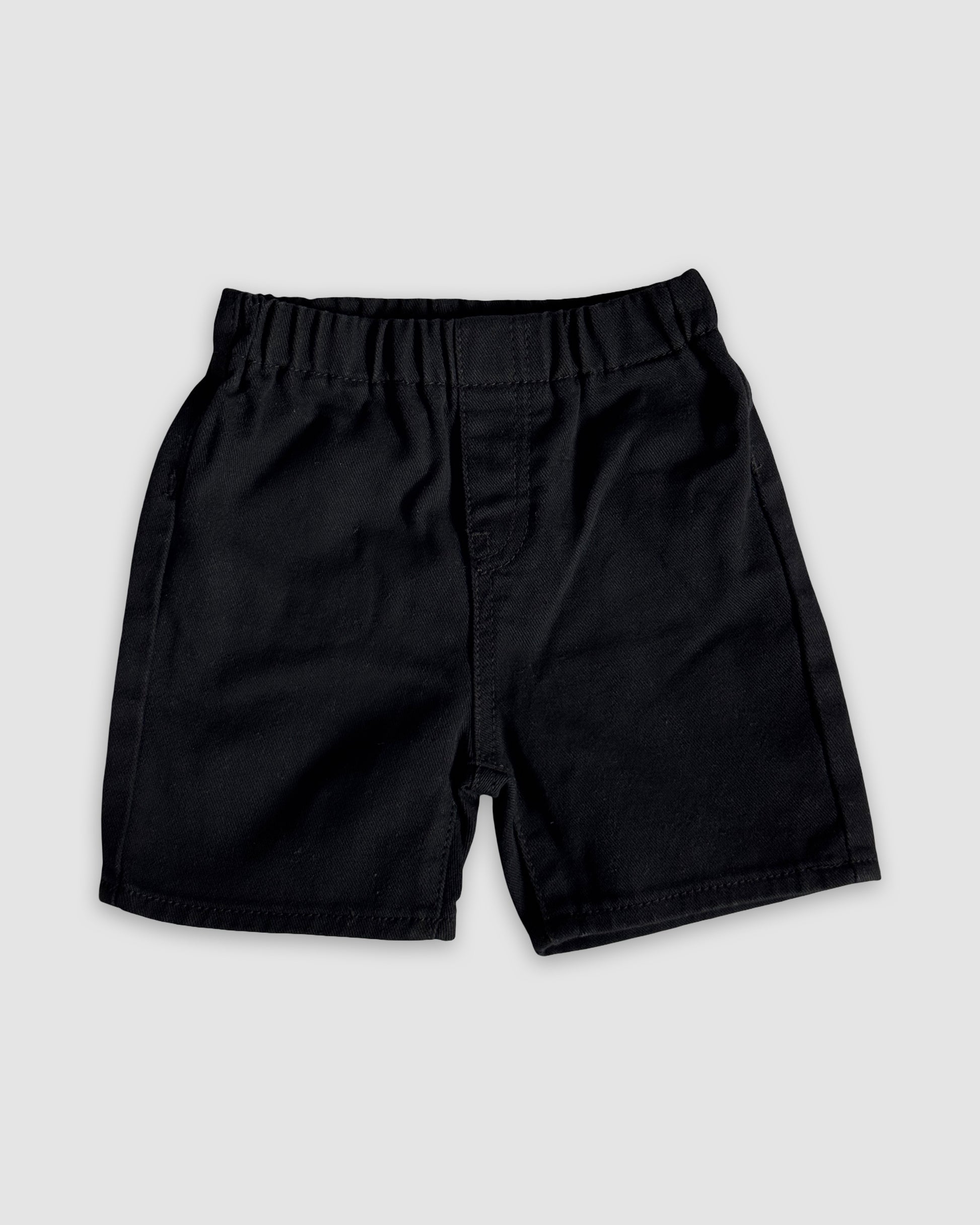 Black shorts on a light gray background