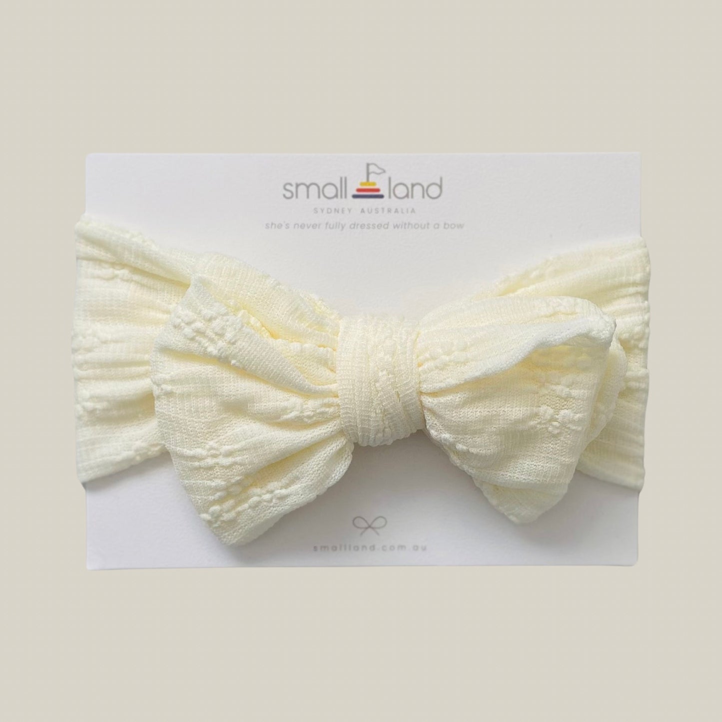 yellow lace headband displayed on packing card